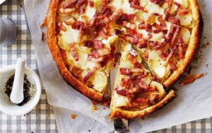 Puff pastry tart with smoked bacon, onion and potato